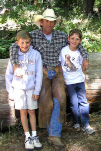 Boys pose with Wrangler John